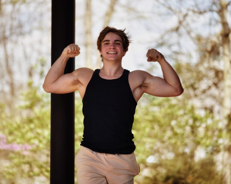 a person flexing the muscles